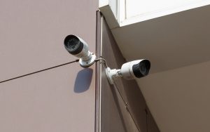 CCTV cameras mounted on a building corner for surveillance